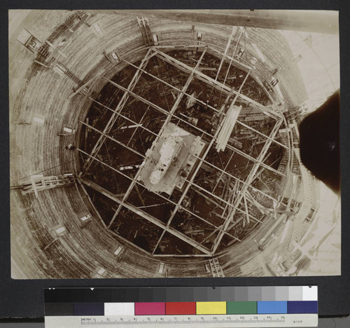 Iron framing for the elevating floor in the great dome of Yerkes Observatory, looking down