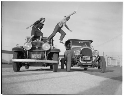 Girls on automobiles, motion picture stunt revue, Gilmore Stadium, Los Angeles. 1939