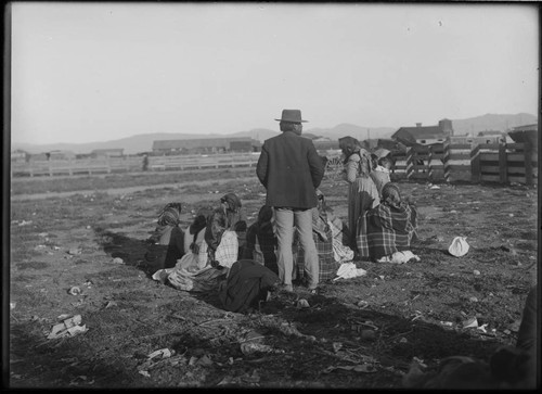 Paiute women gambling near Sparks, Nevada, 1912. Charles Johnson, rancher, standing at center