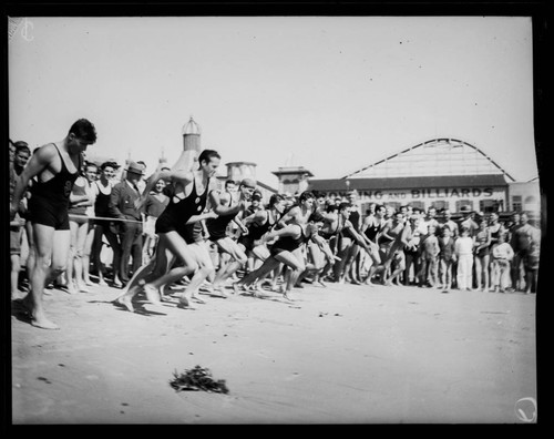 Athletes in a foot race on the beach, Santa Monica