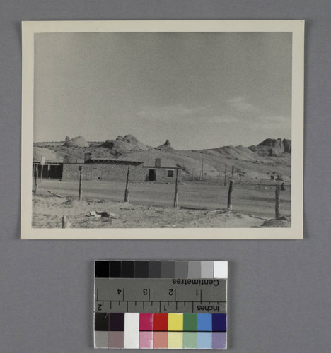 Adobe buildings and rock outcroppings in Kayenta, Arizona