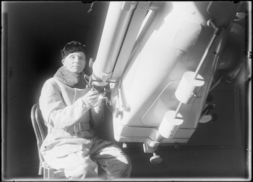 Astronomer sitting at the 10-inch telescope, Mount Wilson Observatory