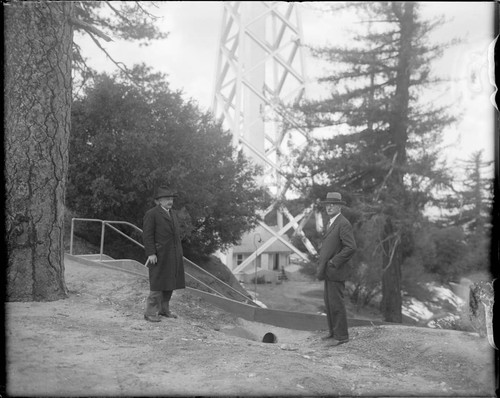 Albert Einstein and Chrles St. John standing near the 150-foot tower telescope, Mount Wilson Observatory