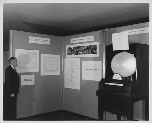 Alfred H. Joy at the variable star exhibit, Mount Wilson Observatory