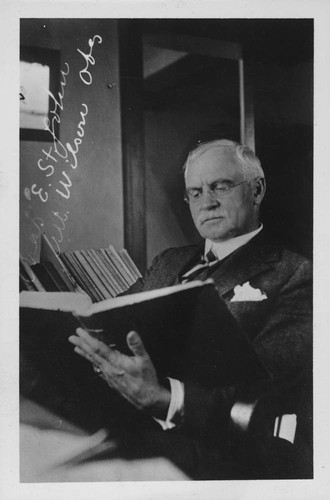 Charles E. St. John, in his office in Pasadena