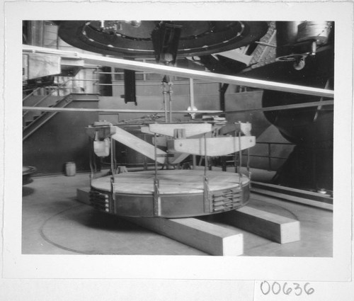 The 100-inch mirror on a lifting device prior to its transfer to the telescope, Mount Wilson Observatory