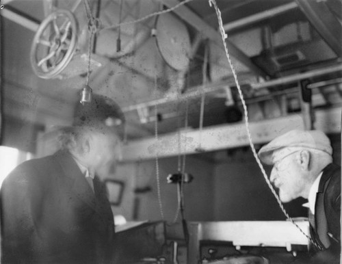 Albert Einstein and Ferdinand Ellerman at the focus of the 150-foot tower telescope, Mount Wilson Observatory