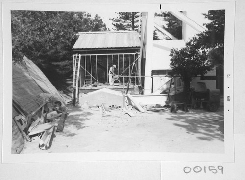 Construction and framing of a computer room addition at the base of the 150-foot tower telescope, Mount Wilson Observatory