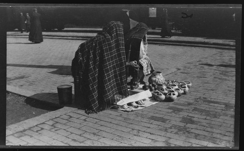 Southwest Indian women with pottery for sale, Albuquerque, New Mexico