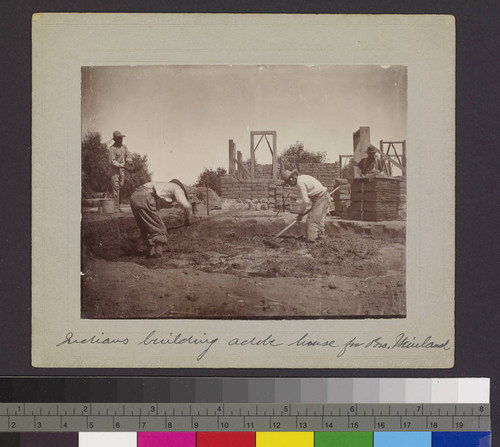 Indians building adobe house for Bro. Weinland