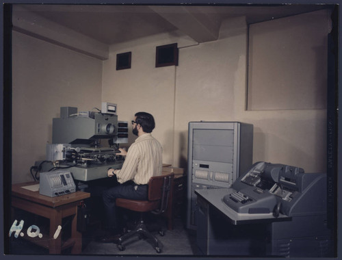 Deane Peterson at the Sartorius iris photometer, Palomar Observatory