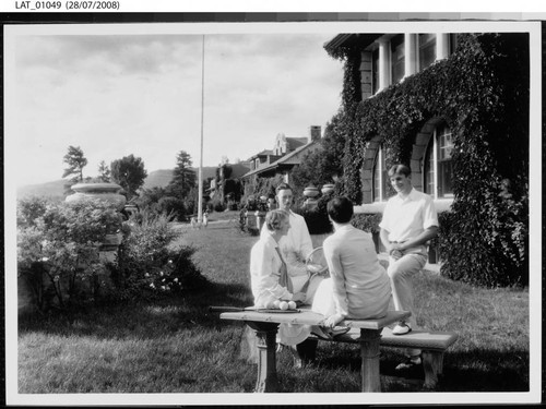 A group of young people talk on Vermejo lodge grounds