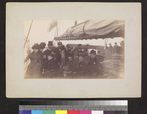 Group of men and women aboard ship