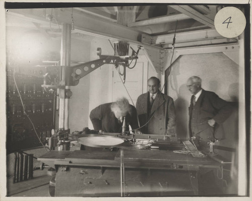 Albert Einstein, Walther Mayer and Charles St. John at the focus of the 150-foot tower telescope, Mount Wilson Observatory