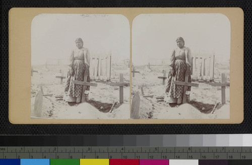 Ramona Lubo at the grave of her husband, Juan Diego, Cahuilla