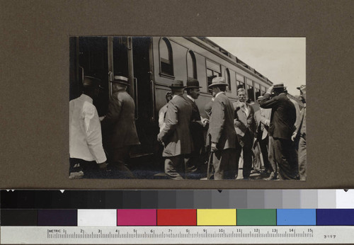 Astronomers boarding a train to Pasadena