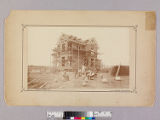 Mr. [B. F.] Ball's house being built by men, Pasadena