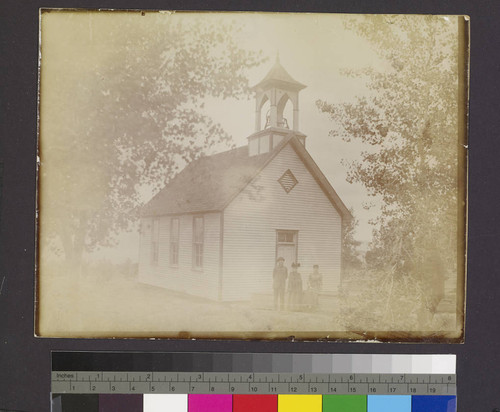 Small group in front of Moravian Mission Chapel