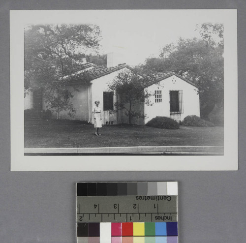 Grace Burke Hubble standing outside her home in San Marino, California