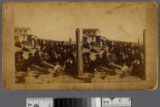 People on beach in front of the Santa Monica Bath House