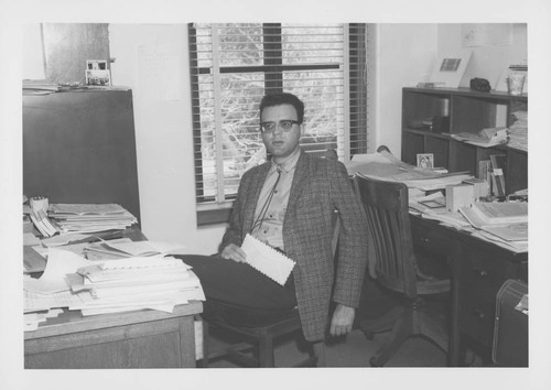 Robert Paul Kraft, seated at his desk, Mount Wilson Observatory