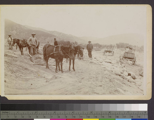 Indians making stone ditches