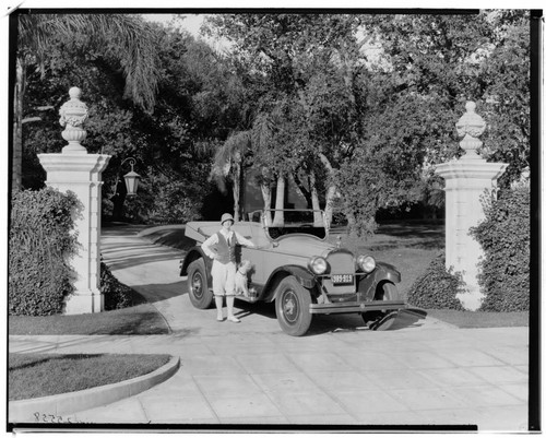 Miss Wiley with Willys-Knight car, 20 Oak Grove Avenue, Pasadena. 1924