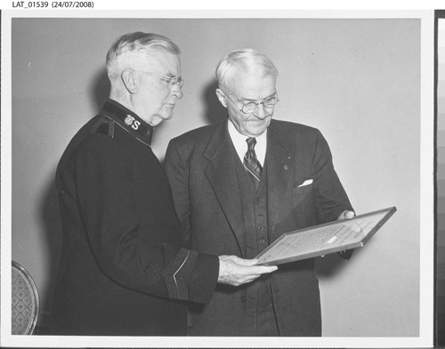 Harry Chandler with a Salvation Army officer