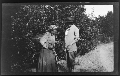 Old Karok woman at Katamine, and Grace Nicholson, right