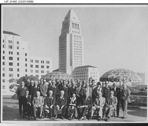 Mr. & Mrs. Harry Chandler with employees on the roof of the Times building