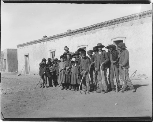 Schoolhouse and school children