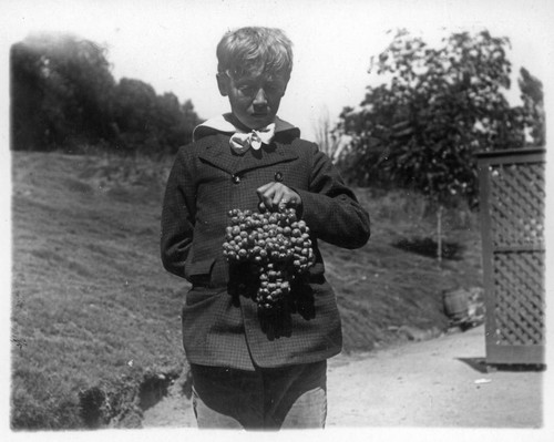 George S. Patton, Jr. with grapes, August 1897