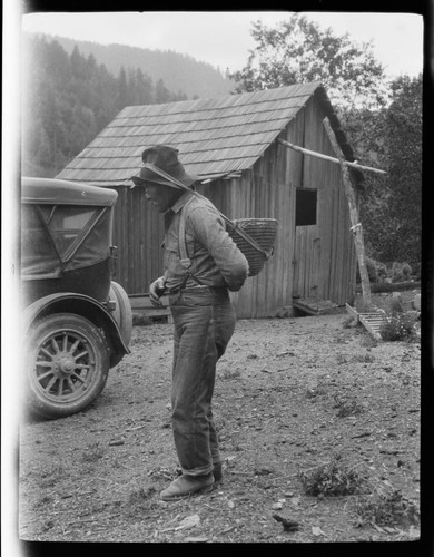 Bob Roberts (Yurok) with burden basket