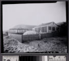 Child in front of Malibu Movie Colony home