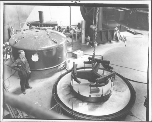 Lowering the 60-inch mirror onto the base of the aluminizing tank, Mount Wilson Observatory