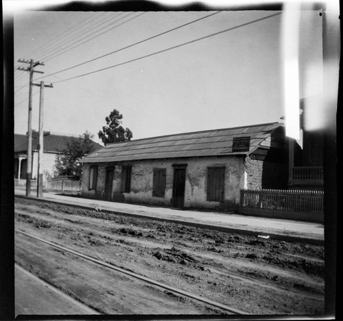 Adobe building with "to lease" sign - "Property running to New High St." (Los Angeles)