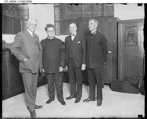 Harry Chandler with Salvation Army representatives