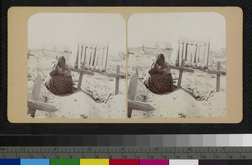 Ramona Lubo at the grave of her husband, Juan Diego, Cahuilla