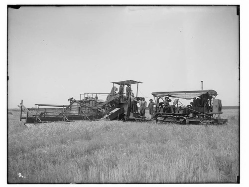 Hoffknecht combined harvester and farmers, Merced County