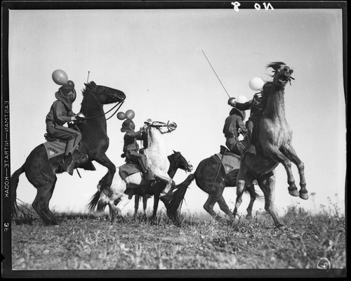 Boys fencing on horseback, Urban Military Academy, Brentwood, Los Angeles