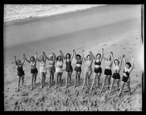 Deauville Club beauty contestants posing on the beach, Santa Monica