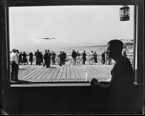 People on pier at the Yacht Harbor Breakwater dedication, Santa Monica