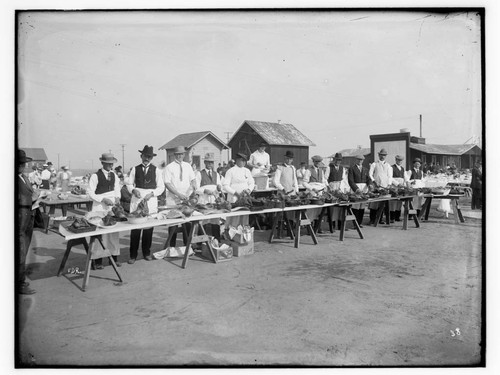 Men carving turkeys, Thanksgiving, Fairmead