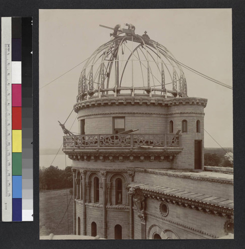 Construction of the south dome of Yerkes Observatory, showing steel framing and construction workers