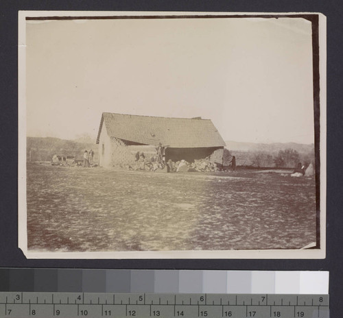 Wrecked adobe house