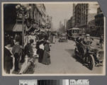 South Broadway street scene with automobiles and horse-drawn carriages, Los Angeles