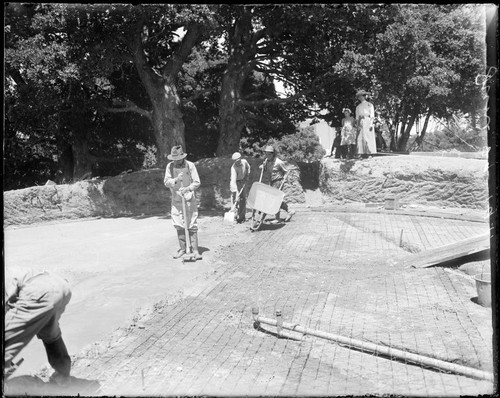 Construction of concrete foundation floor for water reservoir, Mount Wilson