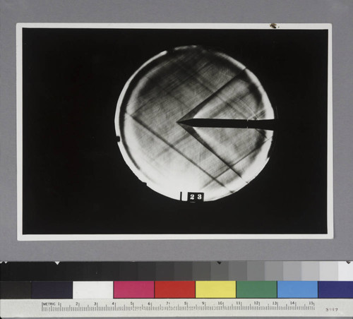 Shadow photograph of wind tunnel test results, showing air stream from a 30-degree cone head