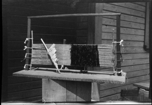 Loom and headband being made by William Benson