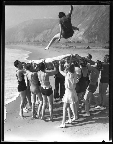 Mary Prince in beach blanket toss, Santa Monica